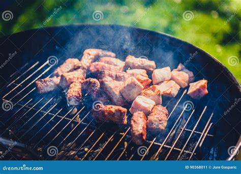 Grilling Delicious Variety Of Meat On Barbecue Charcoal Grill Stock