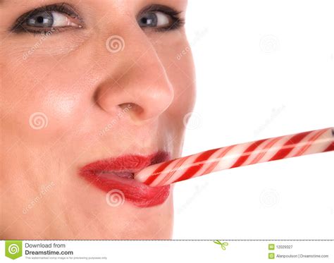 woman sucking candy cane stock image image of attractive 12029327