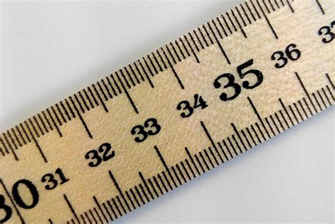 wooden rule meter yard stick ruler imperial metric measurements mm cm inches markings hardwood