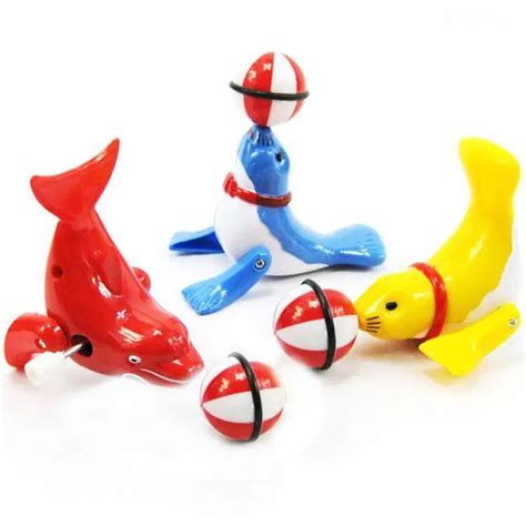 Wind Up Clockwork Dolphin Ball Toys 360 Degrees Rotation Plastic