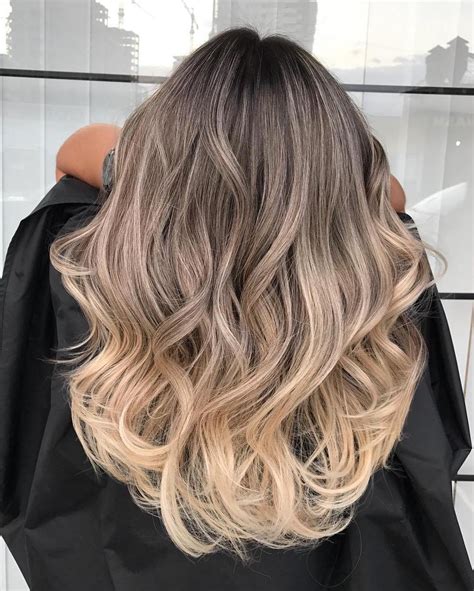 The subtle dirty blonde tones add a ton this pastel pink has been meticulously streaked through the black hair to create a beautiful ombre balayage. The Difference Between Balayage and Ombre (Definitive Guide)