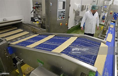 A Employee Watches As Slabs Of Meat Free Quorn Manufactured By Quorn