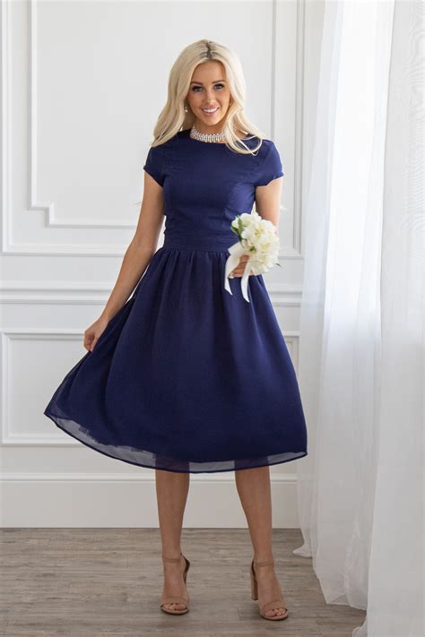 Showcasing newest collections from top designers. JenClothing's "Lucy" Semi-Formal Modest Dress in Navy Blue
