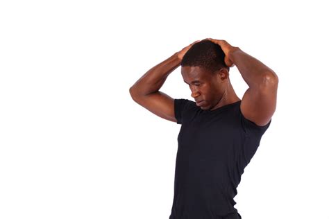 Fitness Man Stretching Neck Muscles To Relieve Neck Pain