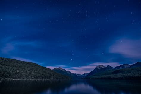 X Resolution Calm Water Between Two Mountains Under The Blue Starry Night Bowman Lake