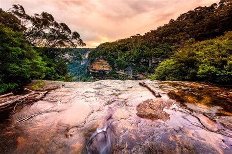 Water Flowing Over The Cliff Face In Blue Mountains Stock Image Image
