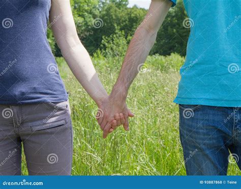 Man And Woman Holding Hands Stock Photo Image Of Hand Holding 93887868