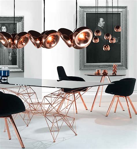 This sleek design features a square seat cushion upholstered in plush black. Rose Gold Furnishings | Designs & Ideas on Dornob