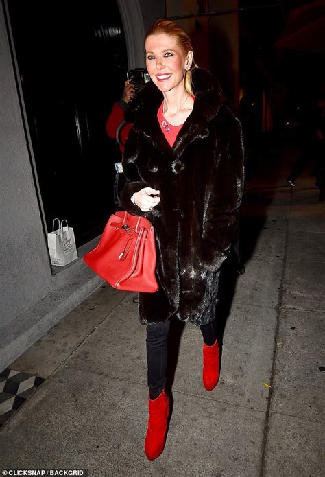 Tara Reid Gets Seasonal As She Juxtaposes Fur Coat With Red Boots And Handbag In Los Angeles