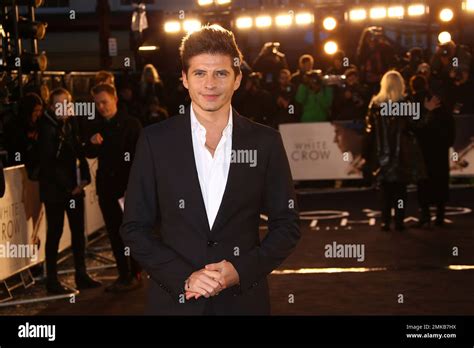 Actor Oleg Ivenko Poses For Photographers Upon Arrival At The Premiere