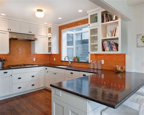.orange backsplash, ceramic backsplash and black countertops orange backsplash tan walls orange backsplash, ceramic backsplash, stainless steel appliances and no island love the use of. Orange Tile Backsplash Home Design Ideas, Pictures ...