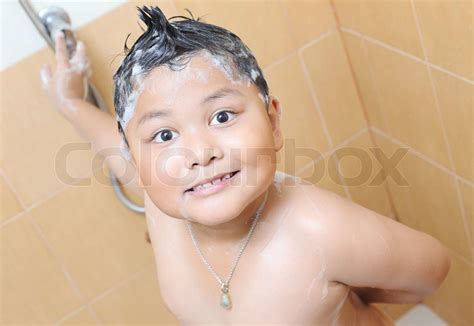 Asian Boy Taking A Bath Stock Image Colourbox