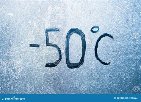 58 Degrees Fahrenheit Or 50 Celsius Number Lettering On Icy Glass