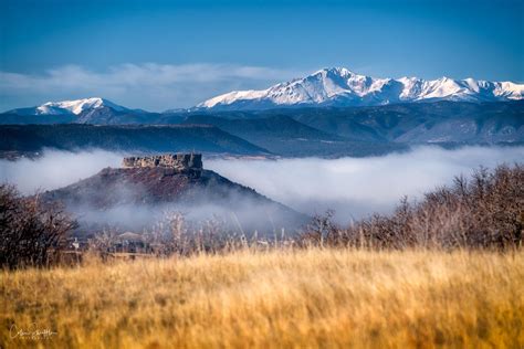 A Rare Layer Of Fog Rolls Through Castle Rock And Engulfs The Iconic