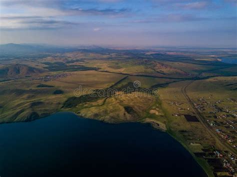 Panoramic View From Drone Of The Lake Near The Mountains Stock Photo