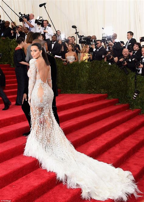 Kim Kardashian Wears Her Most Daring Dress Yet To The Met Gala Met Gala Looks Nice Dresses