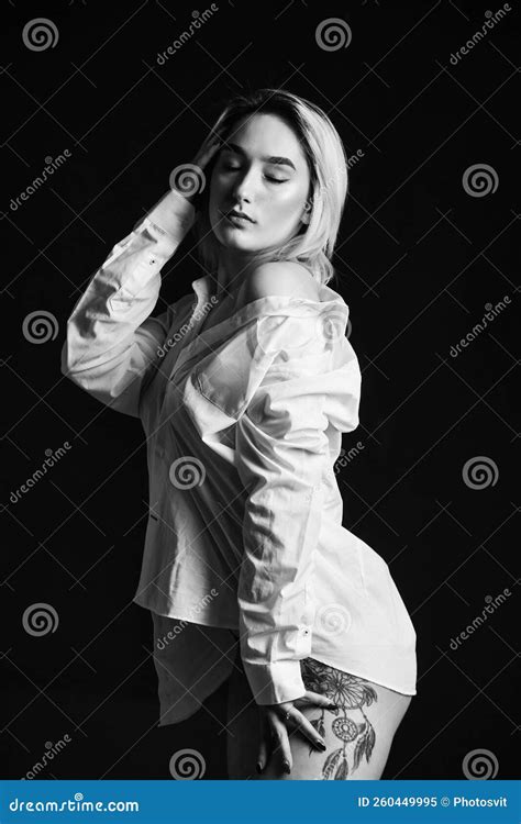 Undressing Woman In Lingerie Royalty Free Stock Photography