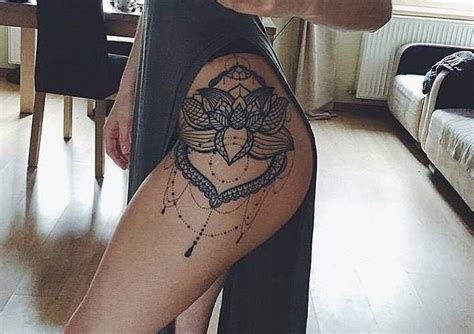 Amazing lotus flowers tattoo on female left side thigh. 50 Hip Tattoos So Stunning We Can't Help but Stare | Thigh ...