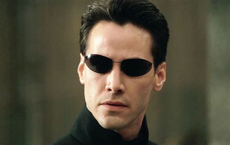 The Matrix 4 Set Photos Give Keanu Reeves Neo A New But Familiar Look