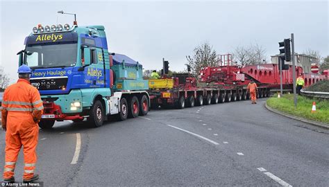 biggest ever load transported on britain s roads weighing more than a space shuttle crawls to