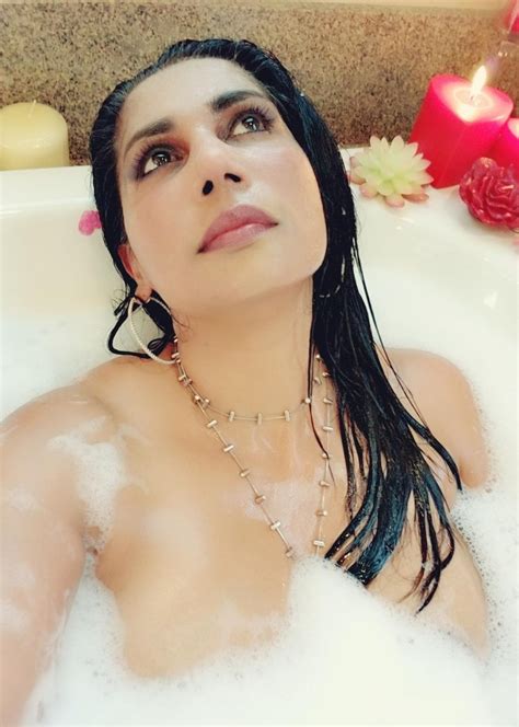 Desi Milf Mini Richard Shows The Top Of Her Boobs Inside A Bathtub