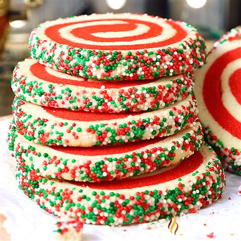 Over the next two weeks, i'm publishing 10 brand new cookie recipes as well as giveaways, the december baking challenge, christmas cookie video tutorials, and so much more. Christmas Pinwheel Sugar Cookies (With VIDEO)
