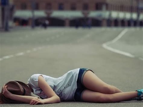 Girl In Hat Lying On The Road Wallpapers And Images Wallpapers