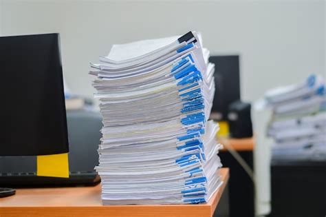 Heap Of Papers Work Stack Documents On Office Desk Premium Photo