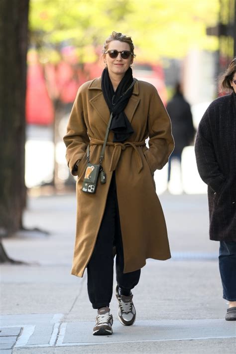 Blake Lively Keeps Things Casual In Wool Coat Sweatpants And Sneakers