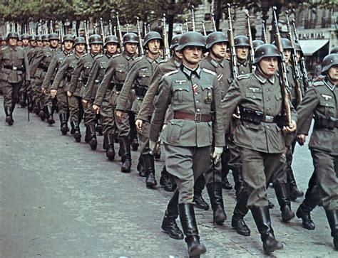 World War Ii Pictures In Details A Column Of German Wehrmacht Paraded In Paris