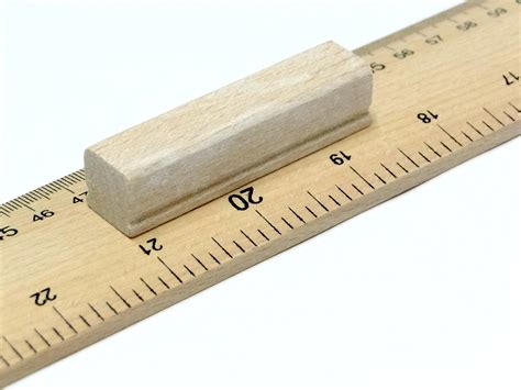 wooden rule 1 meter yard stick ruler imperial and metric measurements mm cm inches markings