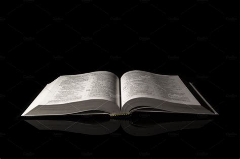 Bible Isolated On Black Background High Quality Stock Photos