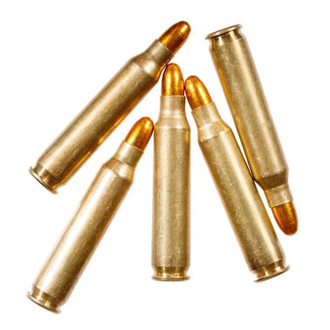 Premium Photo Rifle Bullets On A White Background Macro Photo