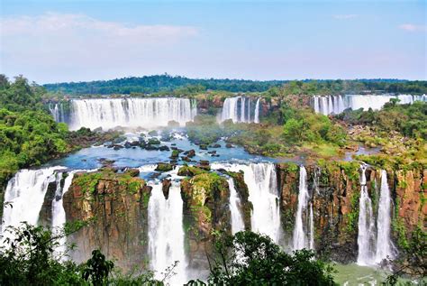 The Iguassu Falls Lie Split Between Brazil And Argentina In A Large
