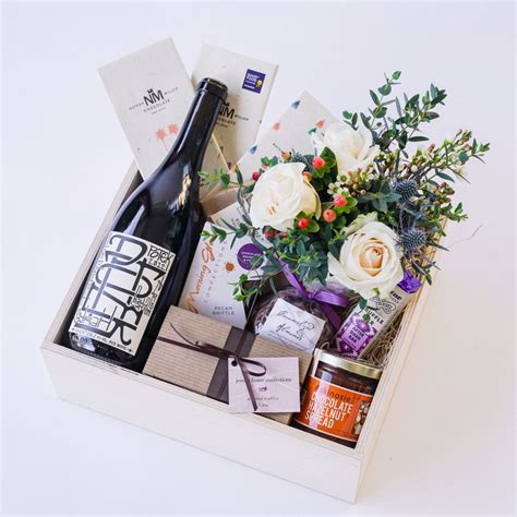 When you want to give something that lasts longer than flowers, surprise someone with a gift hamper picked out just for them! Wine + Chocolate Gift Box with Flowers | Hand Delivery in ...