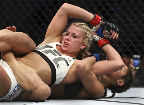 Amanda Cooper Of The United States Tries To Escape A Rear Naked Choke From Cynthia Calvillo Of