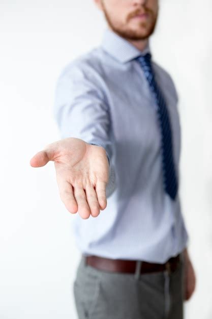 Free Photo Closeup Of Business Man Showing Outstretched Hand