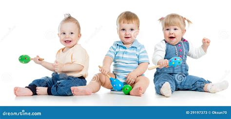 Babies Boys And Girl Playing With Musical Toys Stock Photos Image