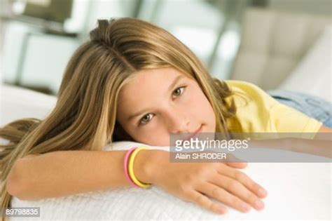 Girl Lying On The Bed Photo Getty Images