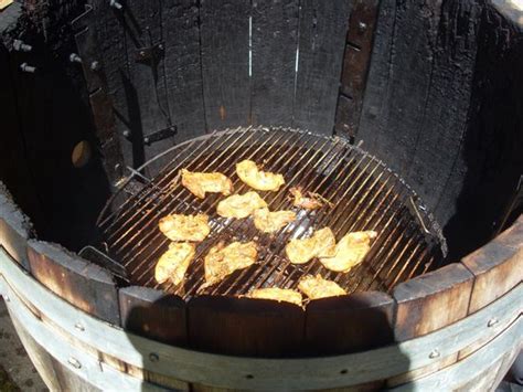 Wine barrels are affordable, beautiful and add rustic charm to any space. cooking food on grill in wine barrel - Picture of Wild ...