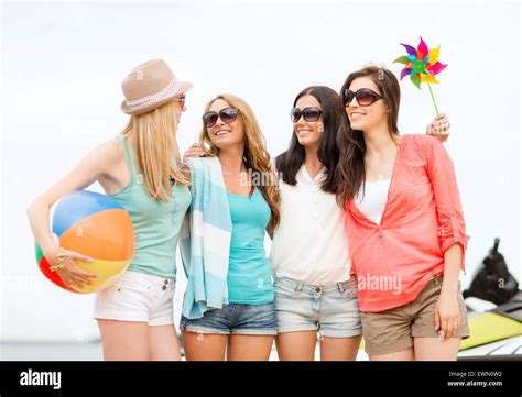 Smiling Girls In Shades Having Fun On The Beach Stock Photo Alamy