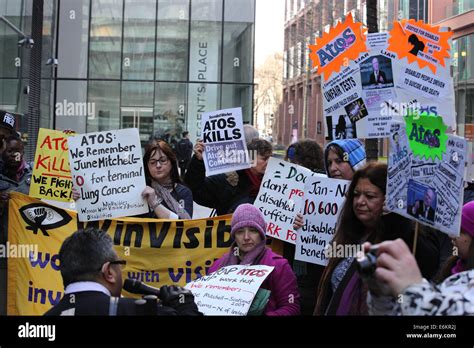 Protesters Stage A Static Demonstration Outside The Atos Headquarters