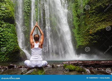 Woman Meditating Doing Yoga Between Waterfalls Stock Photo Image Of