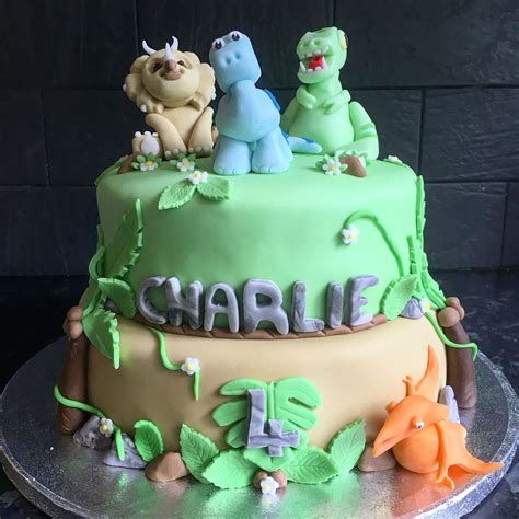 Two Tier Dinosaur Themed Birthday Cake With Handmade Baby Dinosaurs