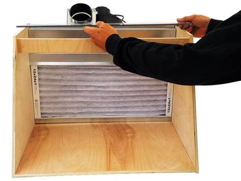 After building the paint booth housing from 2x4s and sheets of white chloroplast, i began working on the ducting to vent the vapors. DIY Hobby Spray Booth - Vent Works