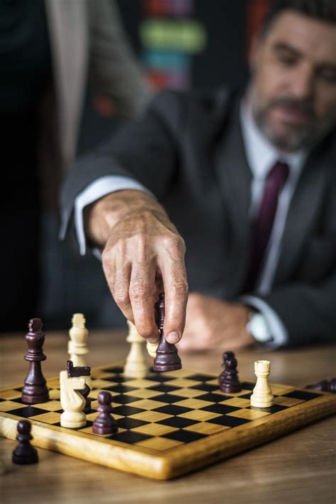 Free Stock Photo Of Close Up Of A Business Man Playing Chess Download