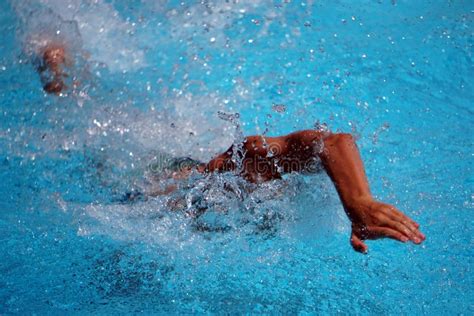 Closeup Shot Of A Professional Swimmer Practicing In The Swimming Pool