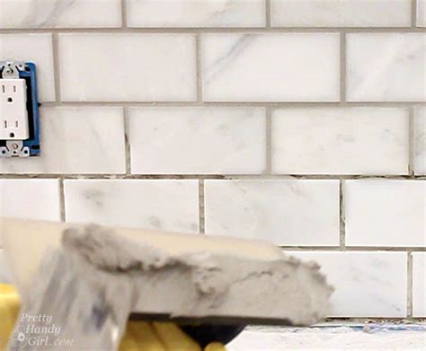 Apparently, he didn't seal the marble tiles before grouting. How to Tile a Backsplash - Part 2: Grouting and Sealing a ...