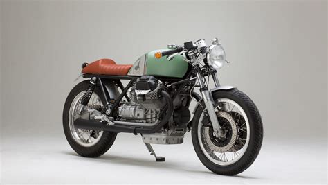 It was an old moto guzzi, owned by the police first, and then destroyed in an accident by its second owner (antonio coco). Moto Guzzi Café Racer by Kaffeemaschine | BikeBrewers.com