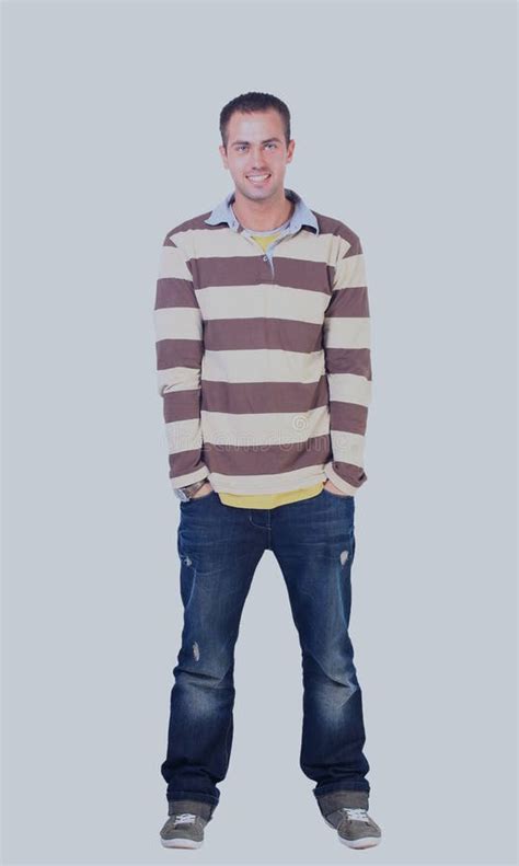 Young Man Standing With Hands In Pockets Stock Photo Image Of Male